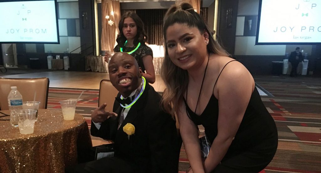 Image shows people at the Joy Prom in Las Vegas, highlighting the law firm's commitment to community support and disability rights, relevant to personal injury cases.