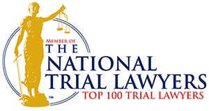 Image of the National Trial Lawyers Top 100 Trial Lawyers badge, featuring the Lady Justice statue, signifying justice and law, and the firm's recognition for personal injury cases in Las Vegas.