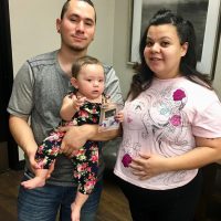 Family and baby Christmas in July 2018