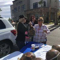 woman handing out turkey 2017