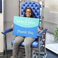 woman in make-a-wish chair