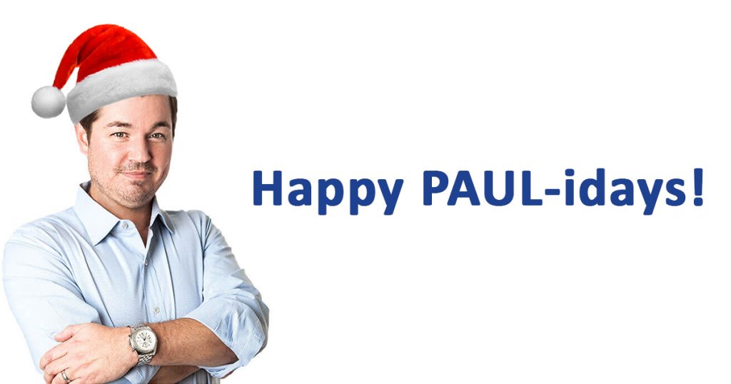 Paulidays 25 Days of Christmas Giveaway 2026 1 A man wearing a Santa hat and a watch is shown from the waist up, wishing the audience a "Happy PAUL-idays!" from his Las Vegas personal injury law firm.
